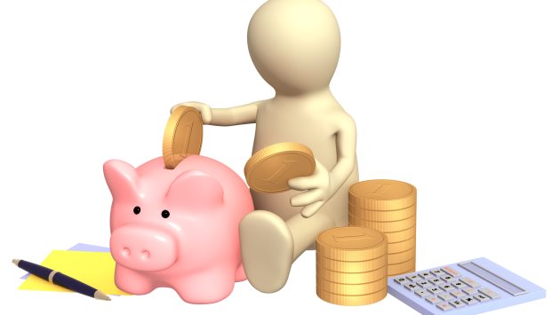 Puppet, piggy bank and calculator. Isolated over white