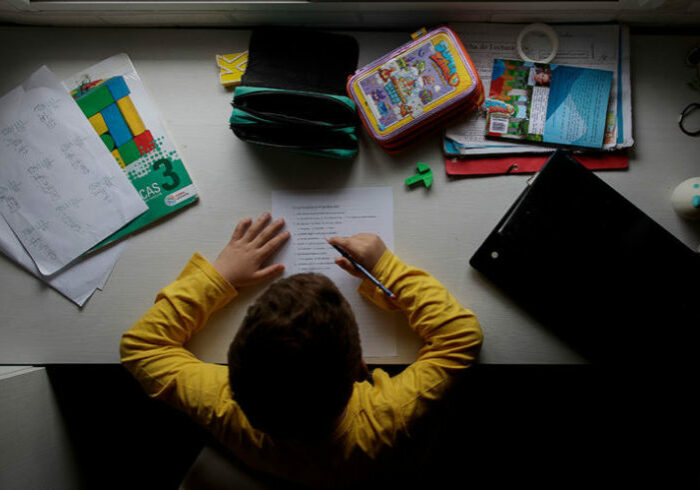 MADRID, SPAIN - APRIL 15: An eight-year-old child, son of the photographer, studies and does his homework at home on the same day that the Minister of Education and Vocational Training, Isabel Celaa, and the Education Councillors of the Autonomous Communities have reached an agreement that schools will be able to open in July to offer students voluntary remedial classes on April 15, 2020 in Madrid, Spain. (Photo by Eduardo Parra/Europa Press via Getty Images)