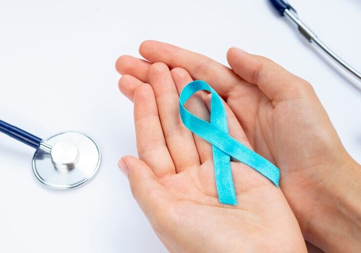 close-up-hands-holding-blue-ribbon-with-stethoscope_23-2148283513