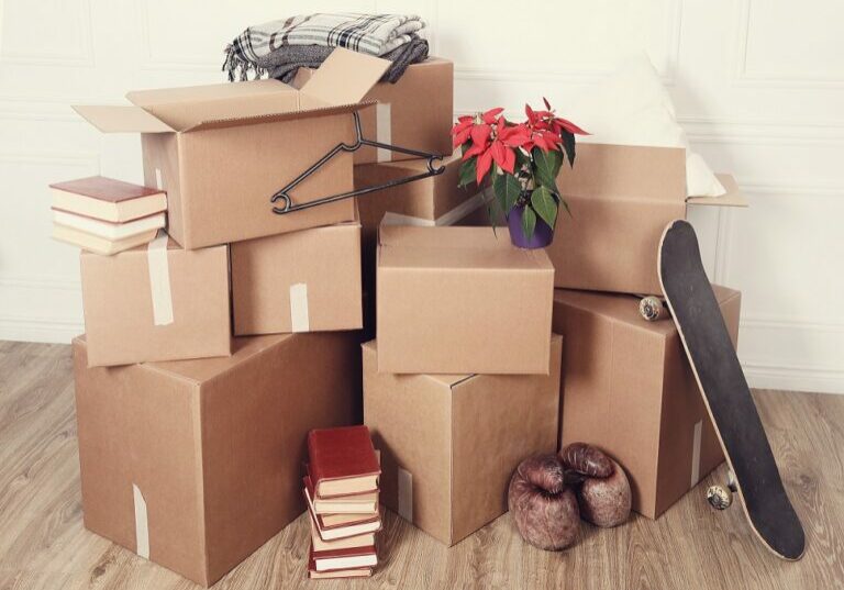 Moving home. Cardboard boxes on the floor