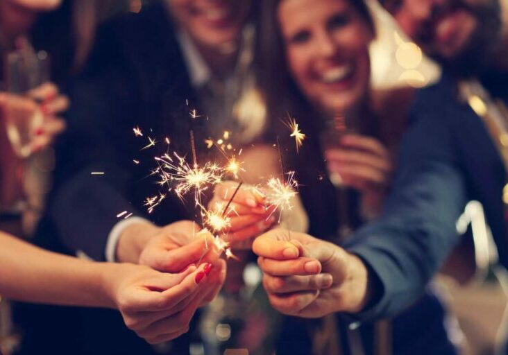 group-friends-having-fun-with-sparklers