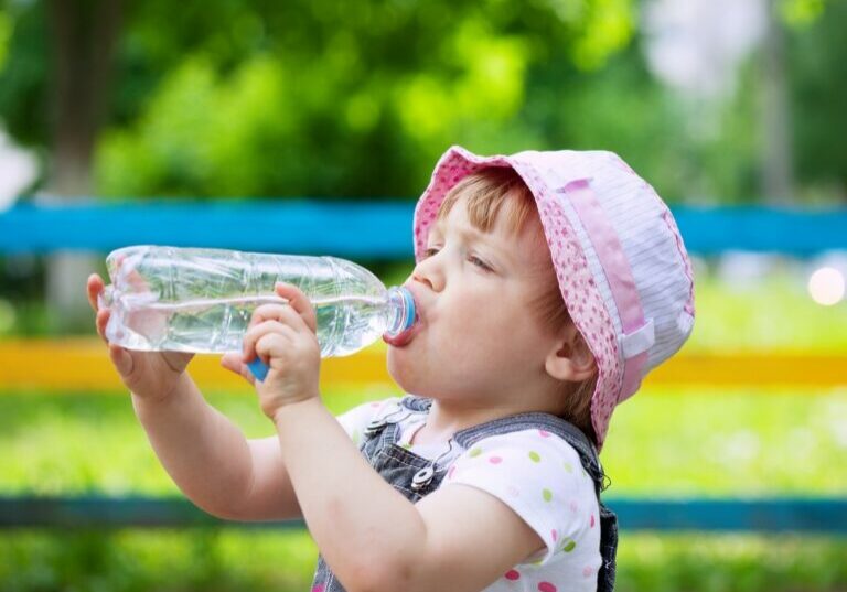 two-year-child-drinks-from-bottle